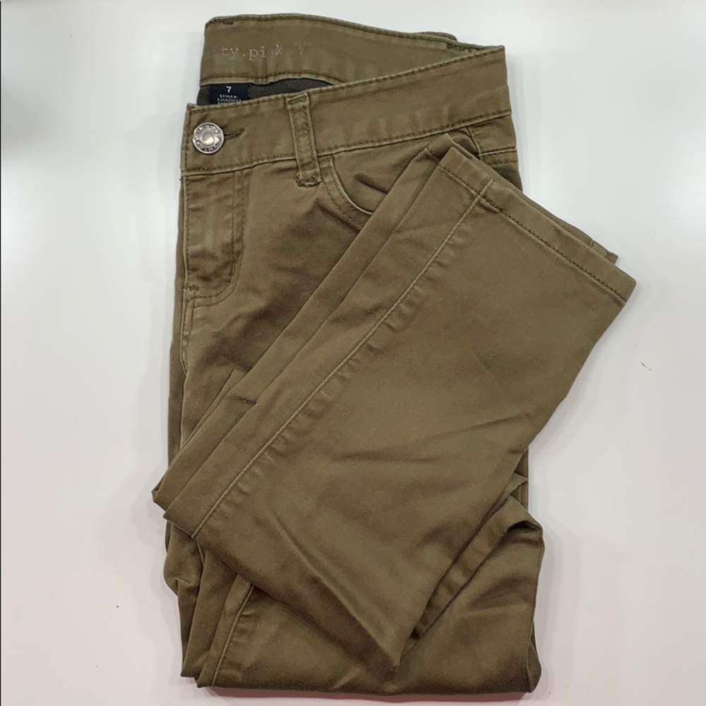 Used green low waisted skinny jeans